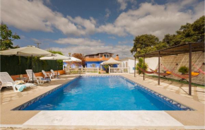 Amazing home in Guillena with Outdoor swimming pool, WiFi and 5 Bedrooms, Guillena